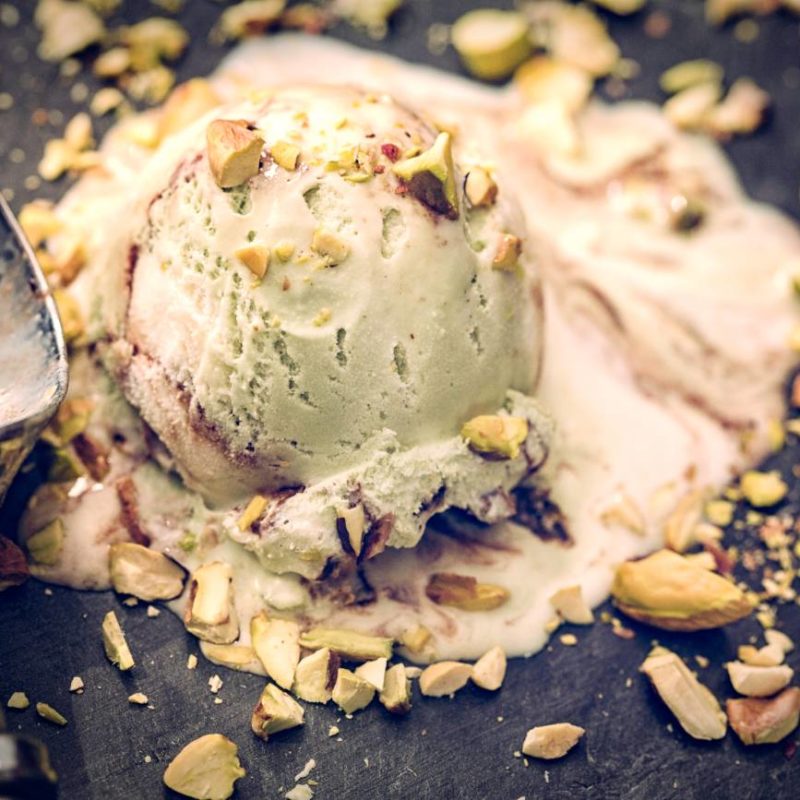 Delicious Pistachio Ice Cream on a Background